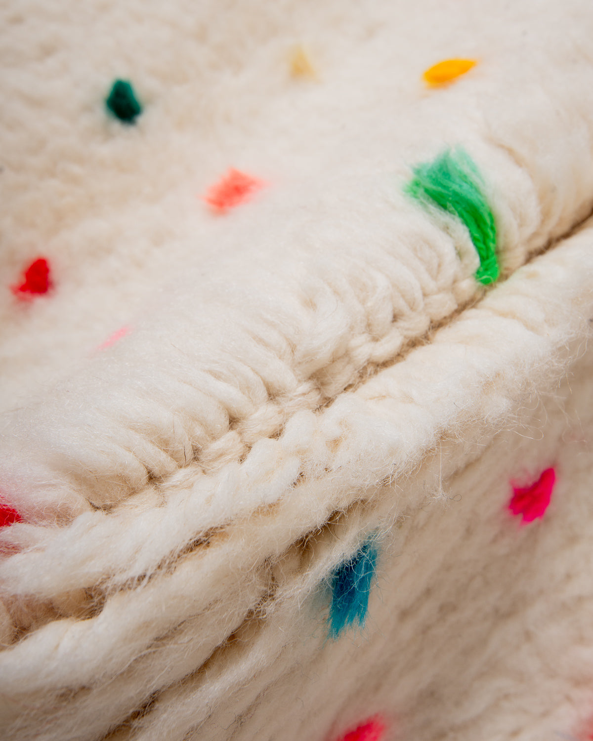 Modern, designer, handcrafted Berber rug from Morocco. Beniourain carpet with beautiful colours and patterns and fluffy wool texture.